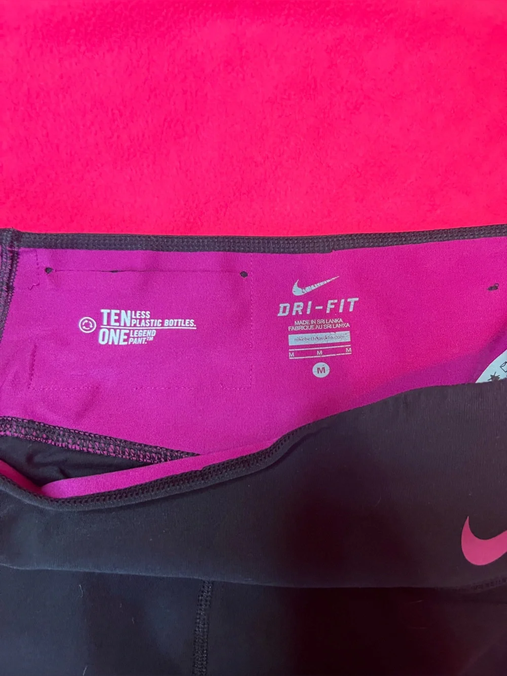 Nike Black Leggings with Purple Swoosh and Logo Accents